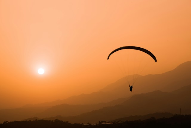 Paraglider during sunset