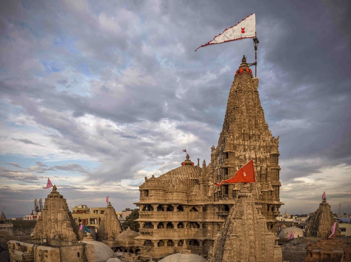 Dwarkadhish Temple amidst numerous surrounding buildings.