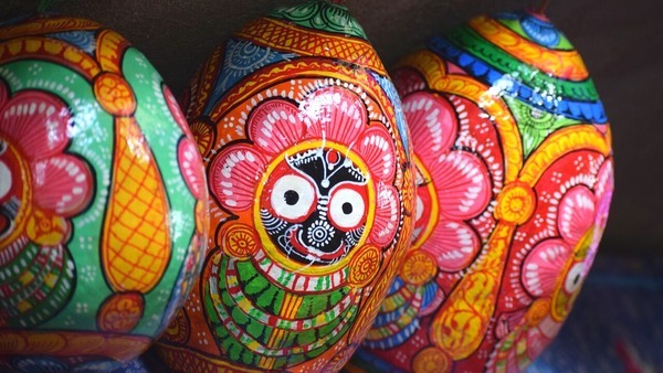 Colorful sculptures with cute faces painted on them. Perfect for decorations or a fun craft project.