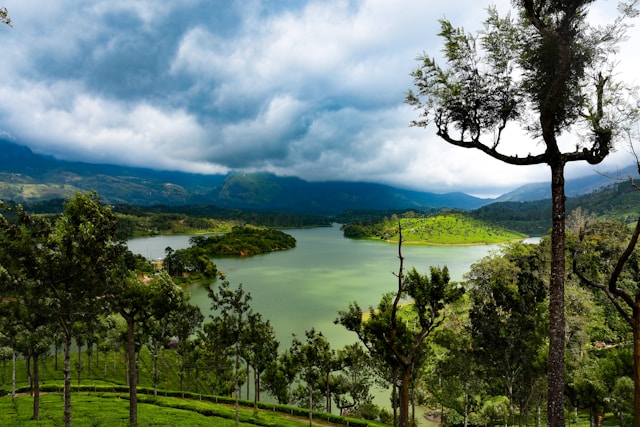 Beautiful image of Anayirankal Dam, Kerala capturing the peaceful atmosphere of a serene lake and lush greenery.